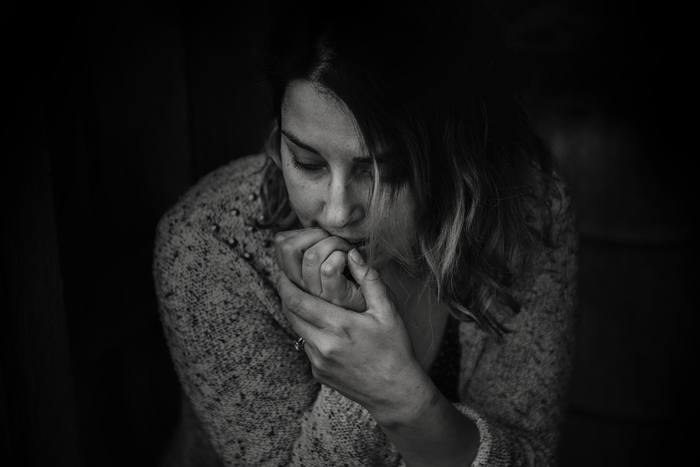 black and white image of sad woman - enabling
