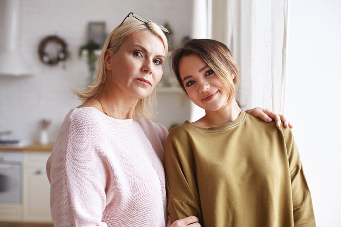 mom looking protective of daughter - codependency